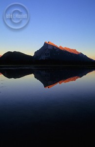 Enjoy a Canadian Rockies sunset on your honeymoon.