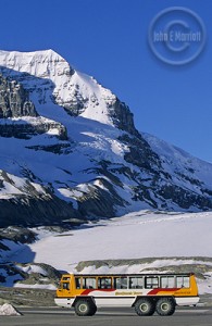 Snocoach in front of the Columbia Icefields, Jasper National Park, Canadian Rockies